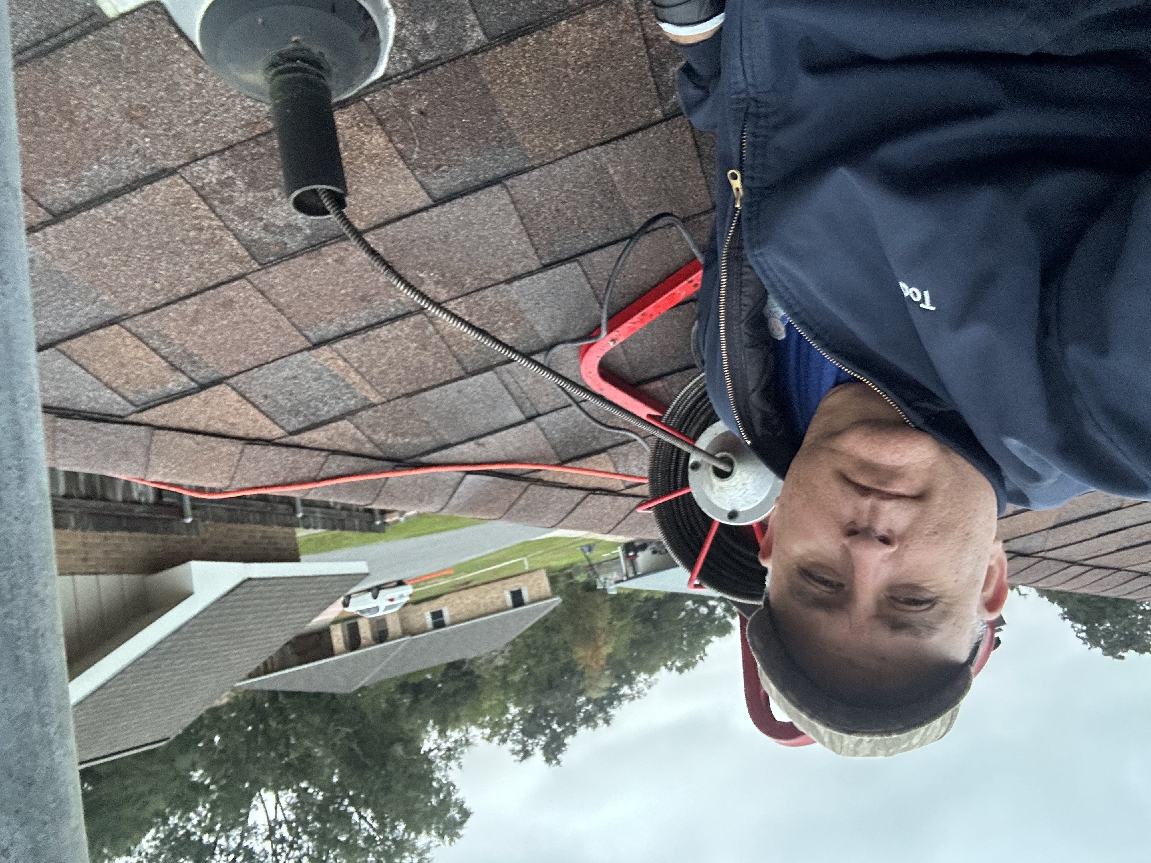 Washing Machine Drain Clog Cleared From Roof Vent 